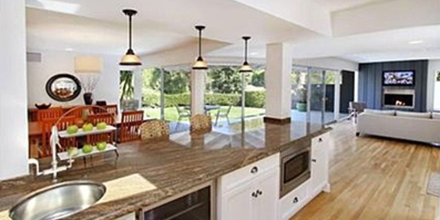 Great room combines the dining room, living and family room in one open space.