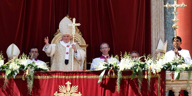 April 8: Pope Benedict XVI greets the faithful after the Urbi and Orbi blessing at the end of the Easter Mass in St. Peter's Square at the Vatican.