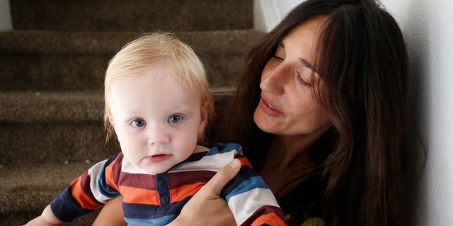 Oct. 20, 2016: In this photo, vegan mother Fulvia Serra holds her 1-year-old son Sebastiano.