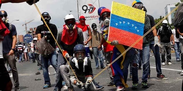 Dozens of people were injured Wednesday and a popular student activist was killed in unclear circumstances.