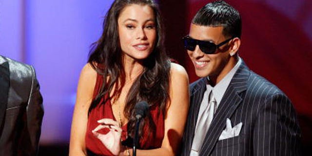 PASADENA, CA - AUGUST 17: (L-R) Rapper Taboo, actress Sofia Vergara, and rapper Daddy Yankee present the Cheetah Girls performance onstage during the 2008 ALMA Awards at the Pasadena Civic Auditorium on August 17, 2008 in Pasadena, California. (Photo by Vince Bucci/Getty Images)
