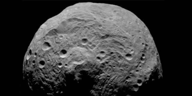 Located in the asteroid belt between Mars and Jupiter, Vesta is not your garden-variety asteroid. Measuring 330 miles across, it's the second largest object in the asteroid belt.