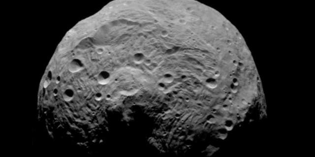 Located in the asteroid belt between Mars and Jupiter, Vesta is not your garden-variety asteroid. Measuring 330 miles across, it's the second largest object in the asteroid belt.