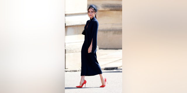Beckham donned her own design to the royal wedding and joked about being pregnant during Prince William and Kate Middleton's 2011 wedding.
