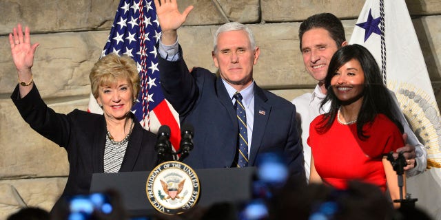 From left, SBA Administrator Linda McMahon, Vice President Mike Pence , Ronald Regan Foster, and Nancy Reagan Foster stand before a crowd on Saturday, March 25, 2017 in Charleston, W.Va.