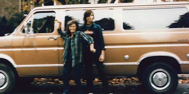 Tanya Van Cuylenborg and Jay Cook with the van they drove to the United States, a bronze 1977 Ford Club wagon.