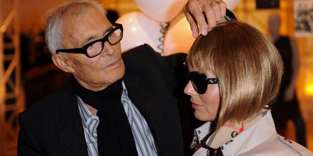 LONDON, ENGLAND - SEPTEMBER 08: Vidal Sassoon attends his autobiography signing with an Anna Wintour lookalike at Selfridges department store on September 8, 2010 in London, England. (Photo by Ian Gavan/Getty Images)
