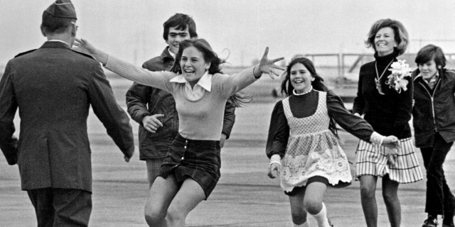 March 17, 1973: Released prisoner of war Lt. Col. Robert L. Stirm is greeted by his family at Travis Air Force Base in Fairfield, Calif., as he returns home from the Vietnam War.