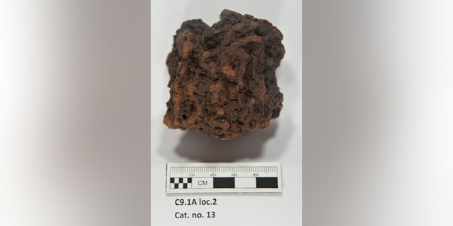 One of the larger lumps of probable roasted bog iron ore, selected samples of which were analyzed by Dr. Thomas Birch and Dr. John Still (Photo: Greg Mumford)