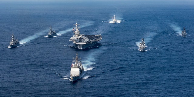 The USS Carl Vinson (CVN 70), the guided-missile destroyer USS Wayne E. Meyer (DDG 108) and the guided-missile cruiser USS Lake Champlain (CG 57) on deployment to the Western Pacific.