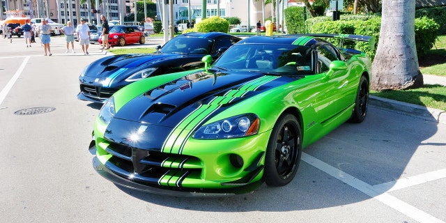 West Palm Beach, USA - January 12, 2014: A Dodge Viper sports car is parked on a city street during a large car show in downtown West Palm Beach. The car show was on public city streets with free access to the public. Pedestrians are visible in the background.
