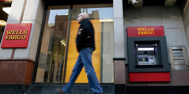 Dec. 19, 2012: A man walks past a Wells Fargo branch in Philadelphia.