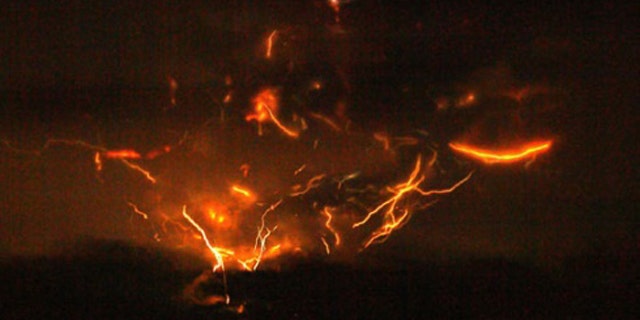 Lightning in the ash cloud atop Mount Redoubt from the eruption on March 28, 2009.