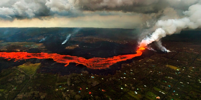 Lava from the Kilauea volcano flows in and around Pahoa, Hawaii, Sunday, June 10, 2018.