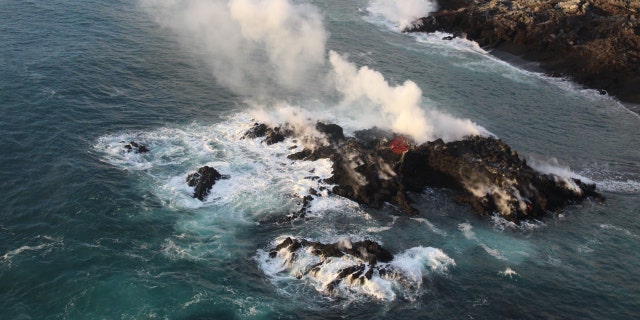 A tiny new island of lava formed off Hawaii's Big Island on the northernmost part of the ocean entry of lava from Fissure 8.