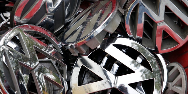 Sept. 23, 2015: Volkswagen ornaments sit in a box in a scrap yard in Berlin, Germany.