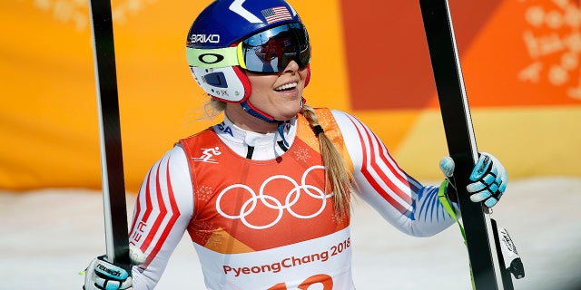 Lindsey Vonn smiles in the finish area of the women's combined downhill at the 2018 Winter Olympics in Jeongseon, South Korea, Thursday, Feb. 22, 2018.