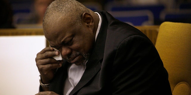 March 6, 2012: Grafton Peterson, father of the late Erin Peterson wipes away a tear after a photo of his daughter was shown to the jury during the wrongful death trial against the Commonwealth of Virginia and Virginia Tech at the Montgomery Circuit Court in Christiansburg, Va.