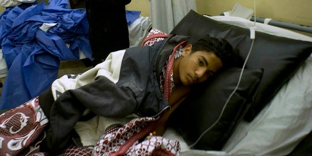 Abdallah Abdel Nasser, 14, receives medical treatment at Suez Canal University hospital in Ismailia, Egypt
