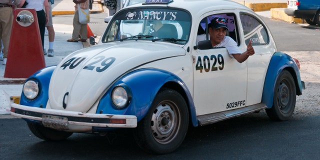 VW Beetle Taxi on the streets of Acapulco, Mexico