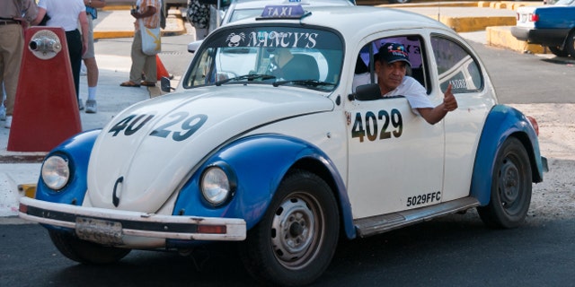VW Beetle Taxi on the streets of Acapulco, Mexico