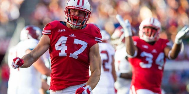 Saturday, Sept. 19: Wisconsin Badgers linebacker Vince Biegel celebrates a sack during the fourth quarter against the Troy Trojans at Camp Randall Stadium in Madison, Wis. The Badgers won 28-3.