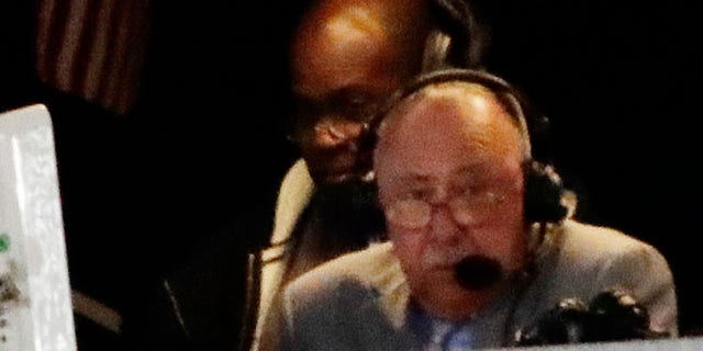 Boston Red Sox broadcaster Jerry Remy works during the seventh inning of a baseball game between the New York Yankees and the Boston Red Sox