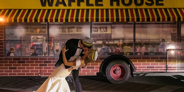 These newlyweds love Waffle House so much, they hired a food truck to appear at the end of the night and posed for photos in front of it.