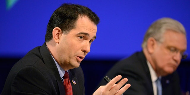 Feb. 23, 2014: Republican Governor Scott Walker of Wisconsin makes remarks during a "Growth and Jobs in America" discussion at the National Governors Association Winter Meeting in Washington.