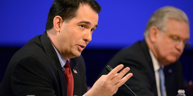 Feb. 23, 2014: Republican Governor Scott Walker of Wisconsin makes remarks during a "Growth and Jobs in America" discussion at the National Governors Association Winter Meeting in Washington.