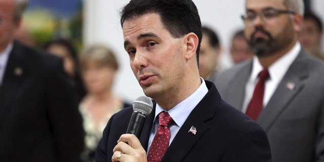 Nov. 9, 2015: Wisconsin Governor Scott Walker speaks at the La Casa de Esperanza school where he and Republican presidential candidate Jeb Bush spoke about education reform, in Waukesha, Wisconsin.