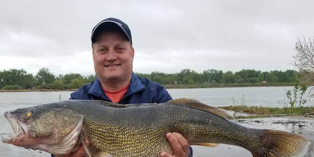 North Dakota man's monster 15-pound walleye catch breaks state's ...