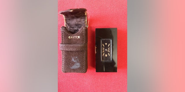 The onyx Cartier watch (Henry Aldridge & Son)