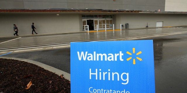 File photo: Job postings are shown outside a new Walmart Super Center as the company opens its first store in Compton, California, U.S., January 10, 2017. (REUTERS/Mike Blake)
