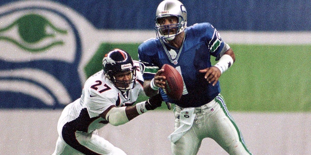 Moon played for four NFL teams over 17 seasons. He is seen here playing for the Seattle Seahawks in 1998.