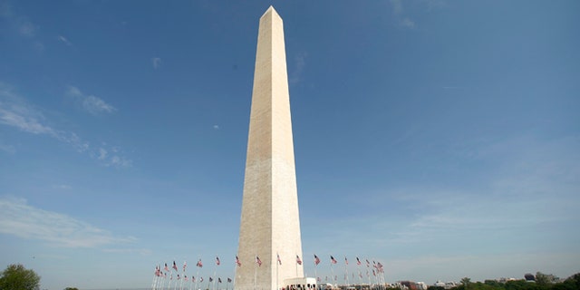 Free from its scaffolding, the Washington Monument is re-opened to the public May 12, 2014. The monument has been closed since 2011 after it suffered widespread damage caused by a 5.8 magnitude earthquake along the East Coast.
REUTERS/Kevin Lamarque (UNITED STATES - Tags: SOCIETY DISASTER) - RTR3OTS0
