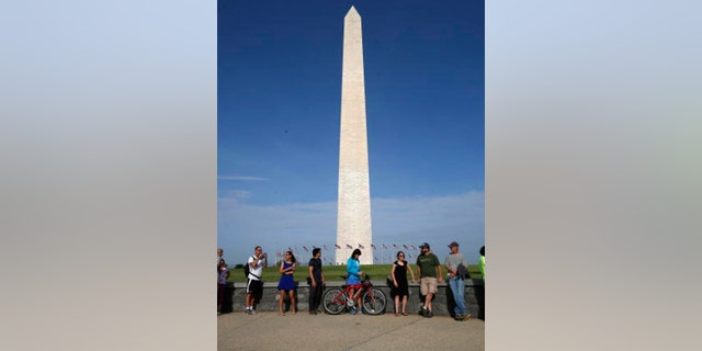 After temporary closure due to malfunctioning elevators, the Washington Monument will reopen Tuesday.