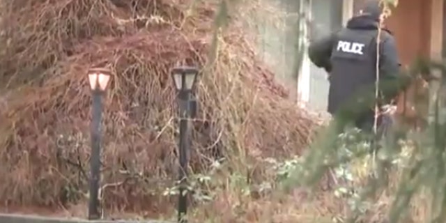 Authorities search the home of Joshua Alexander O'Connor's grandmother in Everett, Wash.