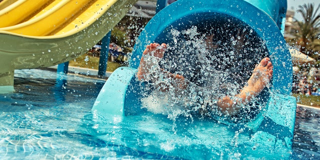 A 12-year-old girl was banned from a water slide because of her insulin pump, her mother claims