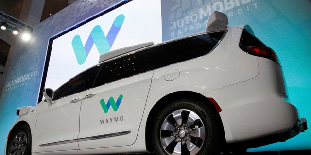 File photo - Waymo unveils a self-driving Chrysler Pacifica minivan during the North American International Auto Show in Detroit, Michigan, U.S., Jan. 8, 2017. (REUTERS/Brendan McDermid)
