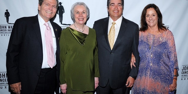 (L-R) Patrick Wayne (JWCI Chairman and son of John Wayne), honoree Marilou Terpenning, honoree Dan Hay, Auxiliary President Anita Swift (granddaughter of John Wayne).