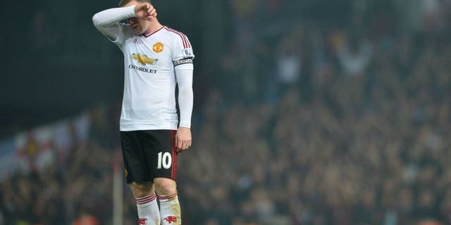 Manchester United's English striker Wayne Rooney reacts after losing the English Premier League football match between West Ham United and Manchester United at The Boleyn Ground in Upton Park, in east London on May 10, 2016. / AFP / GLYN KIRK / RESTRICTED TO EDITORIAL USE. No use with unauthorized audio, video, data, fixture lists, club/league logos or 'live' services. Online in-match use limited to 75 images, no video emulation. No use in betting, games or single club/league/player publications. / (Photo credit should read GLYN KIRK/AFP/Getty Images)