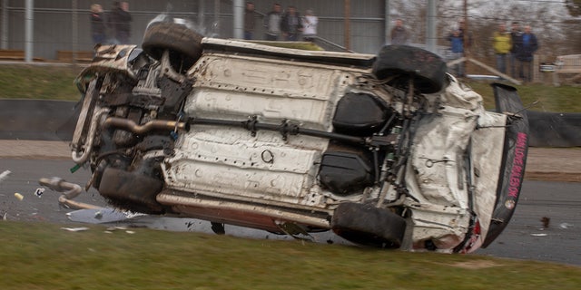 A roll cage protected the driver during the barrel-roll.