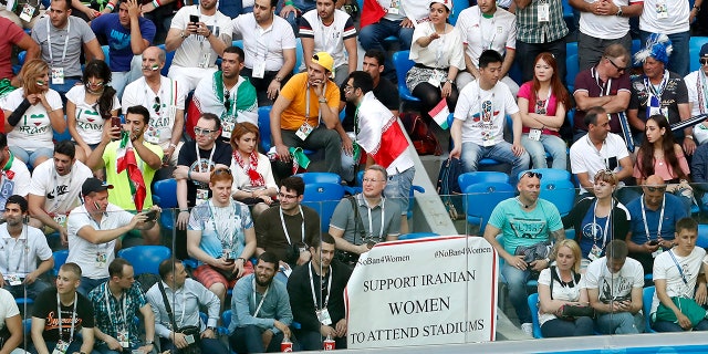 A poster to support Iranian women is displayed in the stands during the group B match between Morocco and Iran at the 2018 soccer World Cup in the St. Petersburg Stadium in St. Petersburg, Russia.