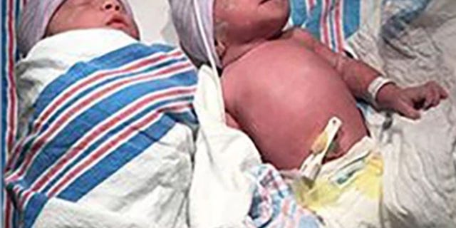 Newborn daughters Isabella and Grace
