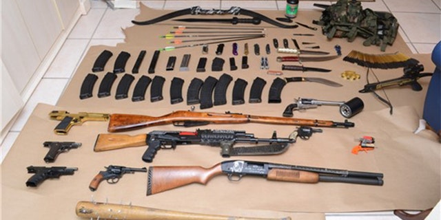 Authorities say these weapons and other lethal items were found in the home of Randall Drake in Dunedin, Florida.