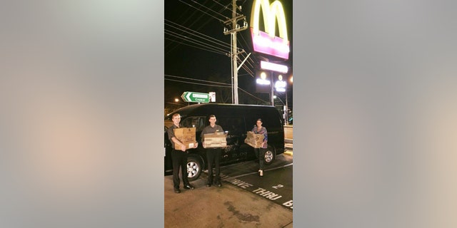 The events manager at the venue sent a crew to go fetch the 450 burgers.