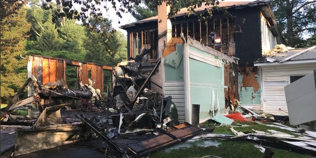 Matthew Denakis tells Fox News his in-laws' garage burned down, as did one side of the home. The roof had also collapsed on the hallway and some of the rooms.