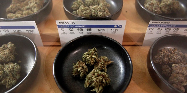 Jan. 1, 2018: Different types of marijuana sit on display at Harborside marijuana dispensary in Oakland, Calif.