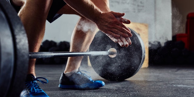 The British fitness coach and personal trainer says he can squat roughly 396 pounds.